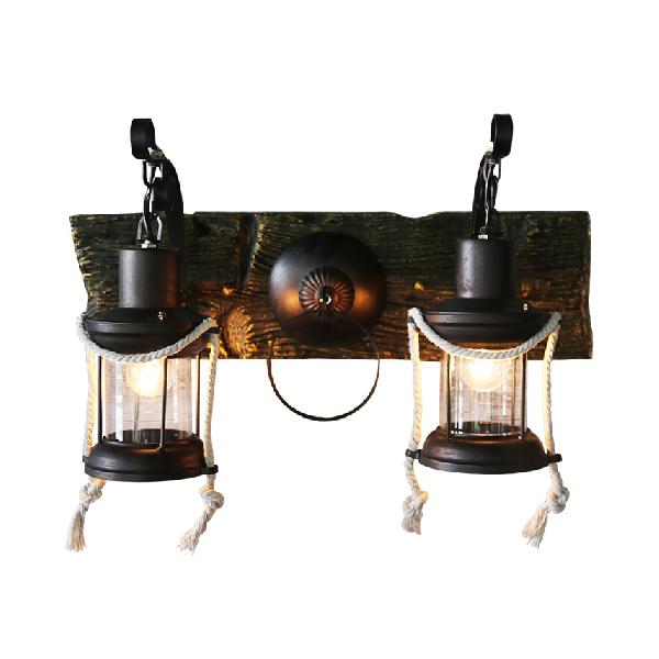 Black 2-Light Sconce Light Industrial Clear Glass Kerosene Lighting Fixture for Bedroom Black Clearhalo 'Industrial wall lights' 'Industrial' 'Middle century wall lights' 'Tiffany' 'Wall Lamps & Sconces' 'Wall Lights' Lighting' 105560