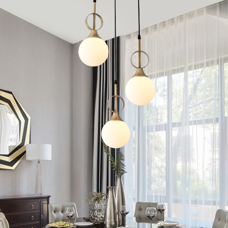 Minimalist Ball Hanging Lamp Kit Opal Glass Single Bedside Pendant with Ring Top in Black-Gold Black-Gold Clearhalo 'Ceiling Lights' 'Modern Pendants' 'Modern' 'Pendant Lights' 'Pendants' Lighting' 1125158