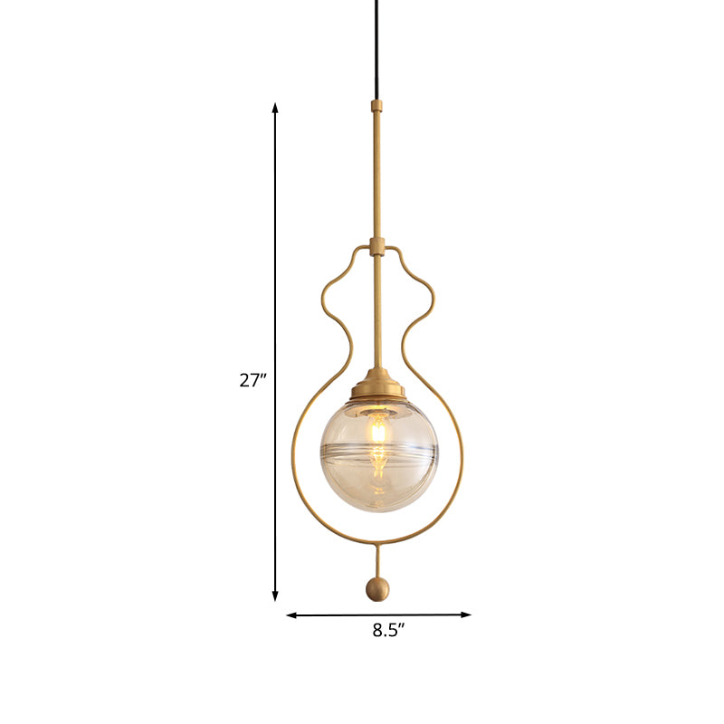 Clear Glass Ball Shade Ceiling Lamp Postmodern 1-Light Hanging Pendant Light with Ground Frame in Gold Clearhalo 'Ceiling Lights' 'Modern Pendants' 'Modern' 'Pendant Lights' 'Pendants' Lighting' 1125181