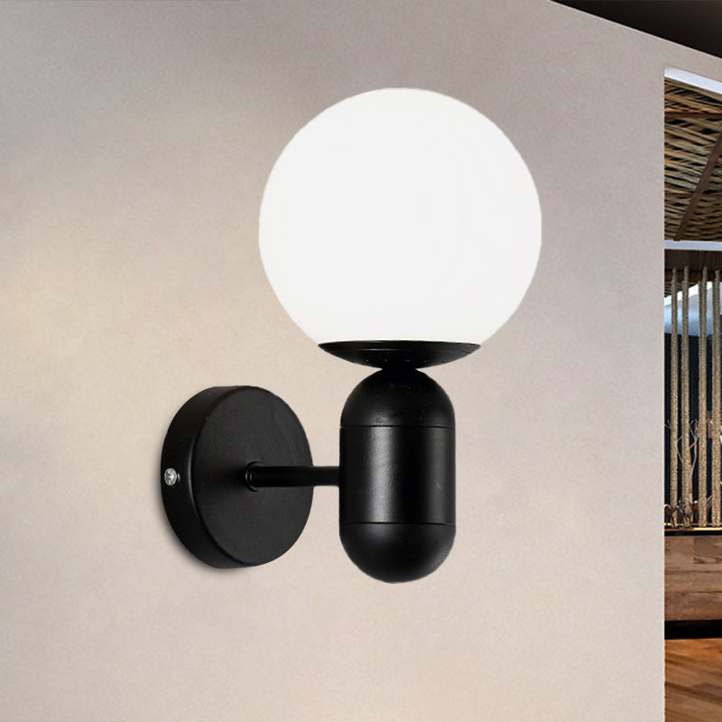 White Globe Shade Wall Lamp with Capsule Body Modern Metal & Glass Wall Light for Meeting Room Black Clearhalo 'Cast Iron' 'Glass' 'Industrial' 'Modern wall lights' 'Modern' 'Tiffany' 'Traditional wall lights' 'Wall Lamps & Sconces' 'Wall Lights' Lighting' 1127886