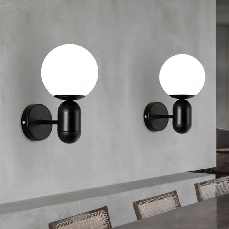 White Globe Shade Wall Lamp with Capsule Body Modern Metal & Glass Wall Light for Meeting Room Clearhalo 'Cast Iron' 'Glass' 'Industrial' 'Modern wall lights' 'Modern' 'Tiffany' 'Traditional wall lights' 'Wall Lamps & Sconces' 'Wall Lights' Lighting' 1127888