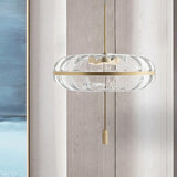 Clear Ribbed Glass Doughnut Pendant Post-Modern 1 Head Brass Hanging Light Fixture over Table Clearhalo 'Ceiling Lights' 'Glass shade' 'Glass' 'Modern Pendants' 'Modern' 'Pendant Lights' 'Pendants' Lighting' 1135684