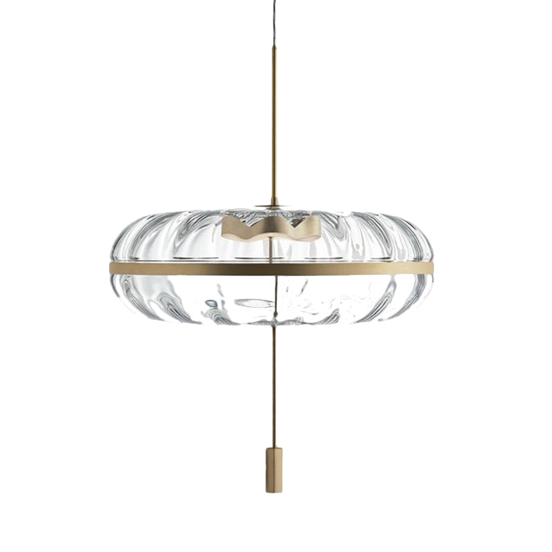 Clear Ribbed Glass Doughnut Pendant Post-Modern 1 Head Brass Hanging Light Fixture over Table Clearhalo 'Ceiling Lights' 'Glass shade' 'Glass' 'Modern Pendants' 'Modern' 'Pendant Lights' 'Pendants' Lighting' 1135685