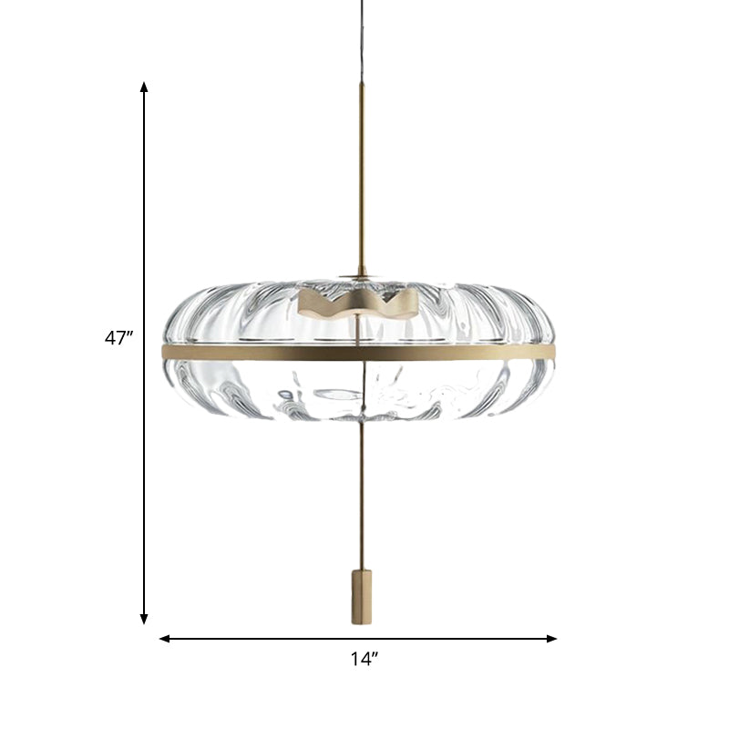 Clear Ribbed Glass Doughnut Pendant Post-Modern 1 Head Brass Hanging Light Fixture over Table Clearhalo 'Ceiling Lights' 'Glass shade' 'Glass' 'Modern Pendants' 'Modern' 'Pendant Lights' 'Pendants' Lighting' 1135686