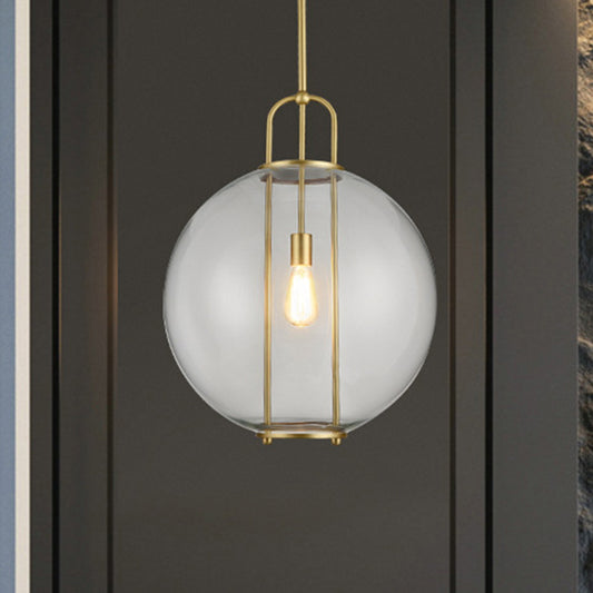 Postmodern Globe Clear Glass Hanging Lamp 1-Light Ceiling Pendant in Brass for Bedside Clear Clearhalo 'Ceiling Lights' 'Glass shade' 'Glass' 'Modern Pendants' 'Modern' 'Pendant Lights' 'Pendants' Lighting' 1135719