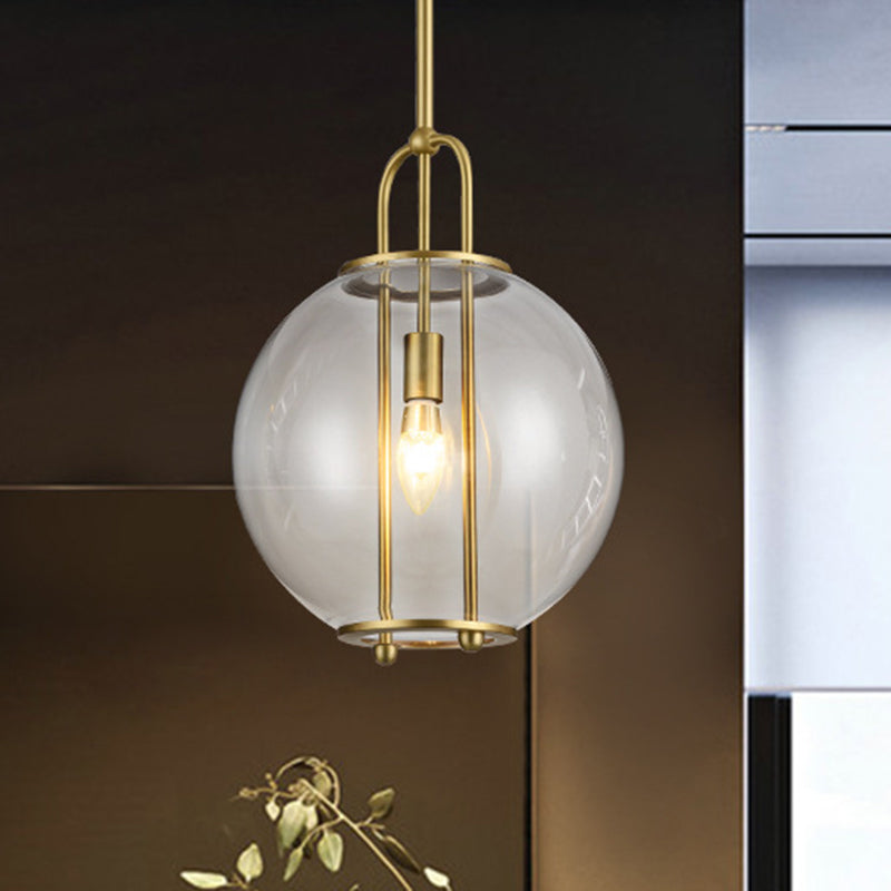 Postmodern Globe Clear Glass Hanging Lamp 1-Light Ceiling Pendant in Brass for Bedside Clearhalo 'Ceiling Lights' 'Glass shade' 'Glass' 'Modern Pendants' 'Modern' 'Pendant Lights' 'Pendants' Lighting' 1135720