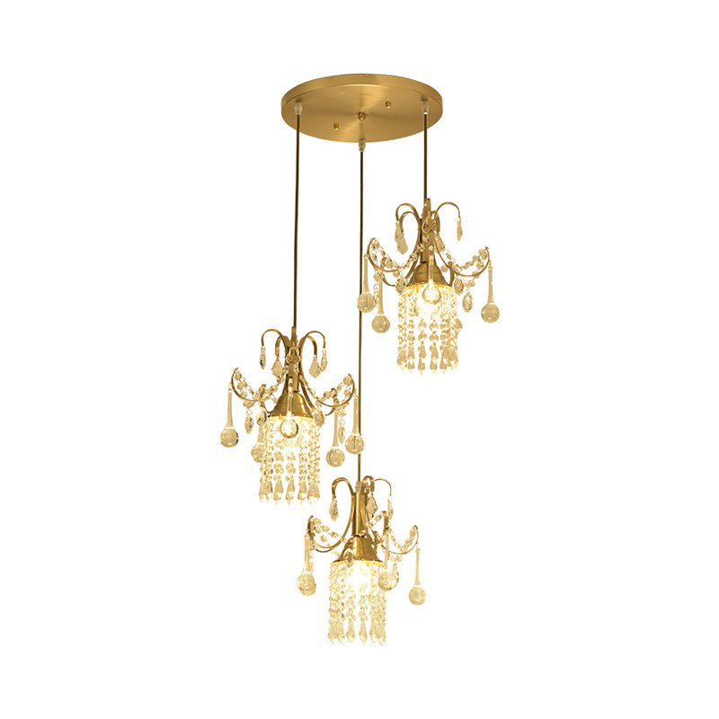 Cylinder Multi Ceiling Light Modernist Crystal Droplet 3 Lights Dining Room Pendant in Brass Clearhalo 'Ceiling Lights' 'Modern Pendants' 'Modern' 'Pendant Lights' 'Pendants' Lighting' 1136317