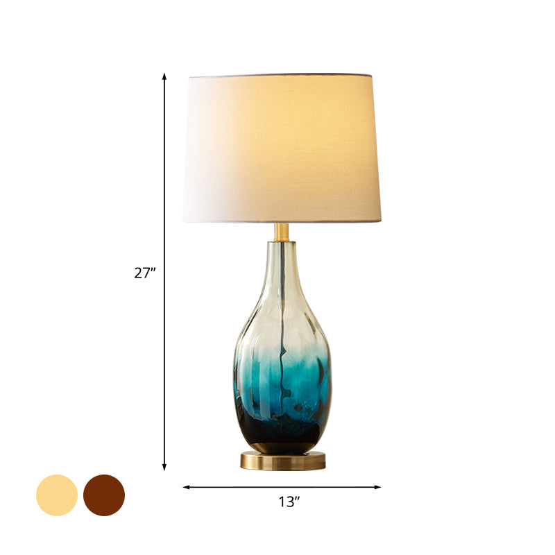 Beige/Brown 1 Head Nightstand Lamp Contemporary Fabric Drum Table Lighting with Jar Fading Blue Glass Base Clearhalo 'Lamps' 'Table Lamps' Lighting' 1136555