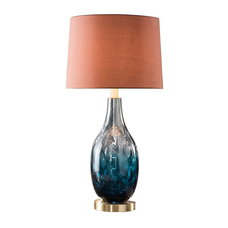 Beige/Brown 1 Head Nightstand Lamp Contemporary Fabric Drum Table Lighting with Jar Fading Blue Glass Base Clearhalo 'Lamps' 'Table Lamps' Lighting' 1136559