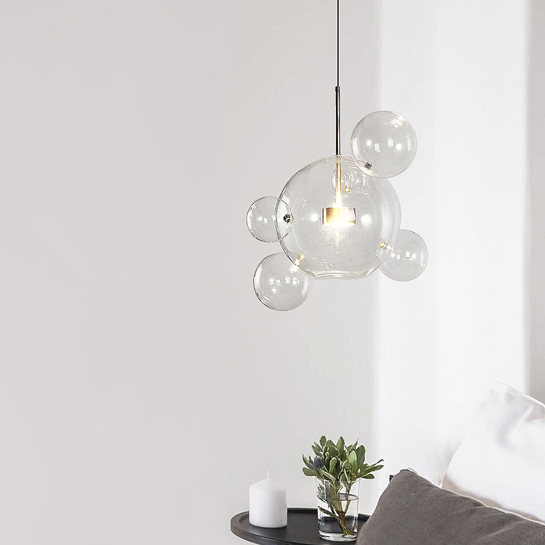 Clear Glass Ball Pendant Light Modernist 1/4/6 Lights Led Hanging Ceiling Lamp in Gold with Bubble Design Clearhalo 'Ceiling Lights' 'Glass shade' 'Glass' 'Modern Pendants' 'Modern' 'Pendant Lights' 'Pendants' Lighting' 118594