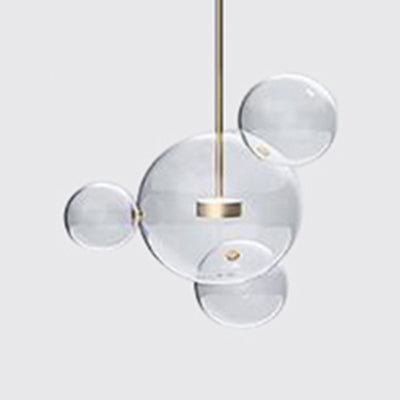 Clear Glass Ball Pendant Light Modernist 1/4/6 Lights Led Hanging Ceiling Lamp in Gold with Bubble Design 4 Gold Clearhalo 'Ceiling Lights' 'Glass shade' 'Glass' 'Modern Pendants' 'Modern' 'Pendant Lights' 'Pendants' Lighting' 118597