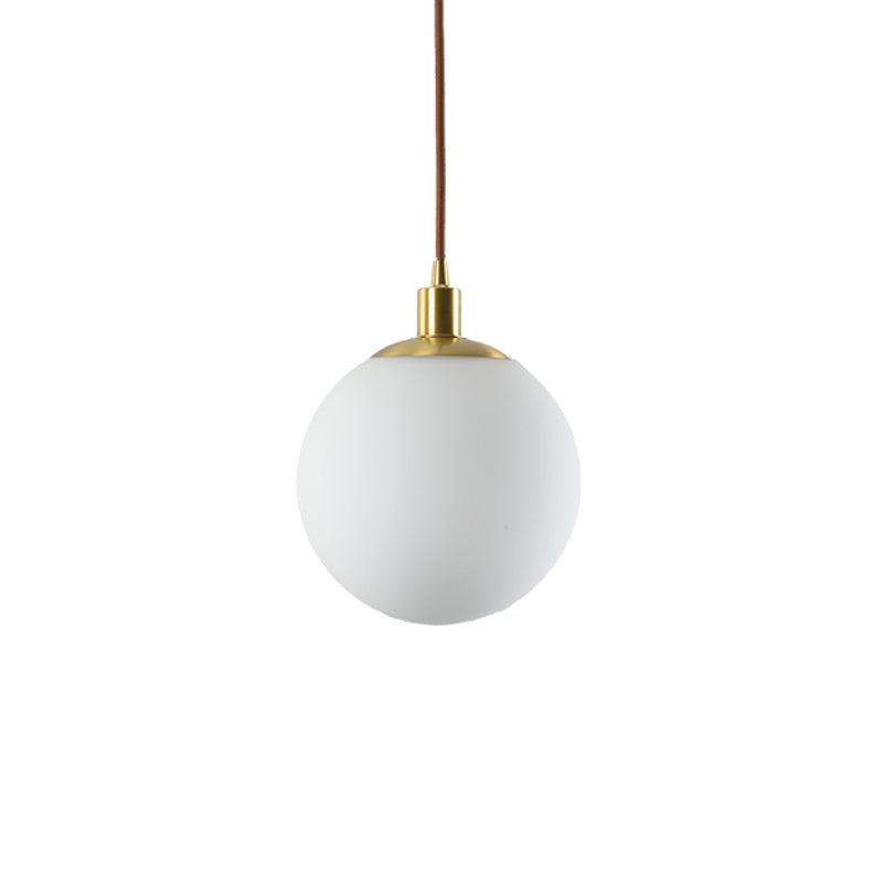 6"/8"/10" Wide Milky Glass Ball Pendant Light Post Modern Led Hanging Ceiling Lamp in Brass Clearhalo 'Ceiling Lights' 'Glass shade' 'Glass' 'Modern Pendants' 'Modern' 'Pendant Lights' 'Pendants' Lighting' 119203