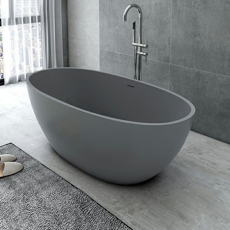 Modern Soaking Freestanding Bath Tub Stone Oval Bathtub with Overflow Trim Clearhalo 'Bathroom Remodel & Bathroom Fixtures' 'Bathtubs' 'Home Improvement' 'home_improvement' 'home_improvement_bathtubs' 'Showers & Bathtubs' 1200x1200_1fa33f82-bfc6-41d0-833a-af7e95041ba8