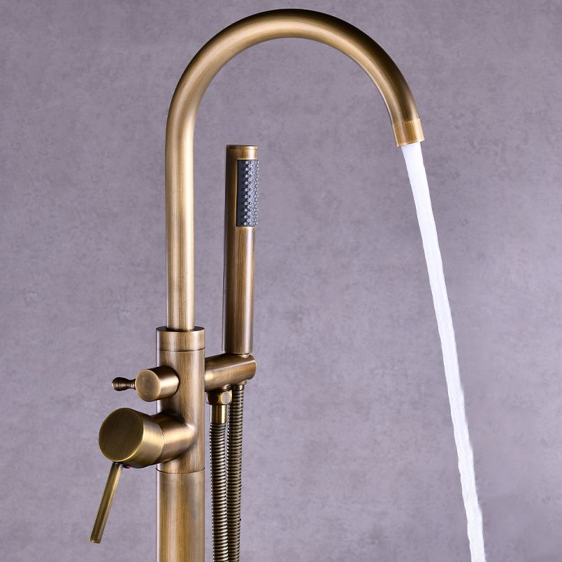 Floor Mounted Freestanding Tub Filler Metal Freestanding Tub Filler Trim with Spray Gun Clearhalo 'Bathroom Remodel & Bathroom Fixtures' 'Bathtub Faucets' 'bathtub_faucets' 'Home Improvement' 'home_improvement' 'home_improvement_bathtub_faucets' 1200x1200_4247e7c5-ed9a-4ed9-b790-1ab27bd4a7c4