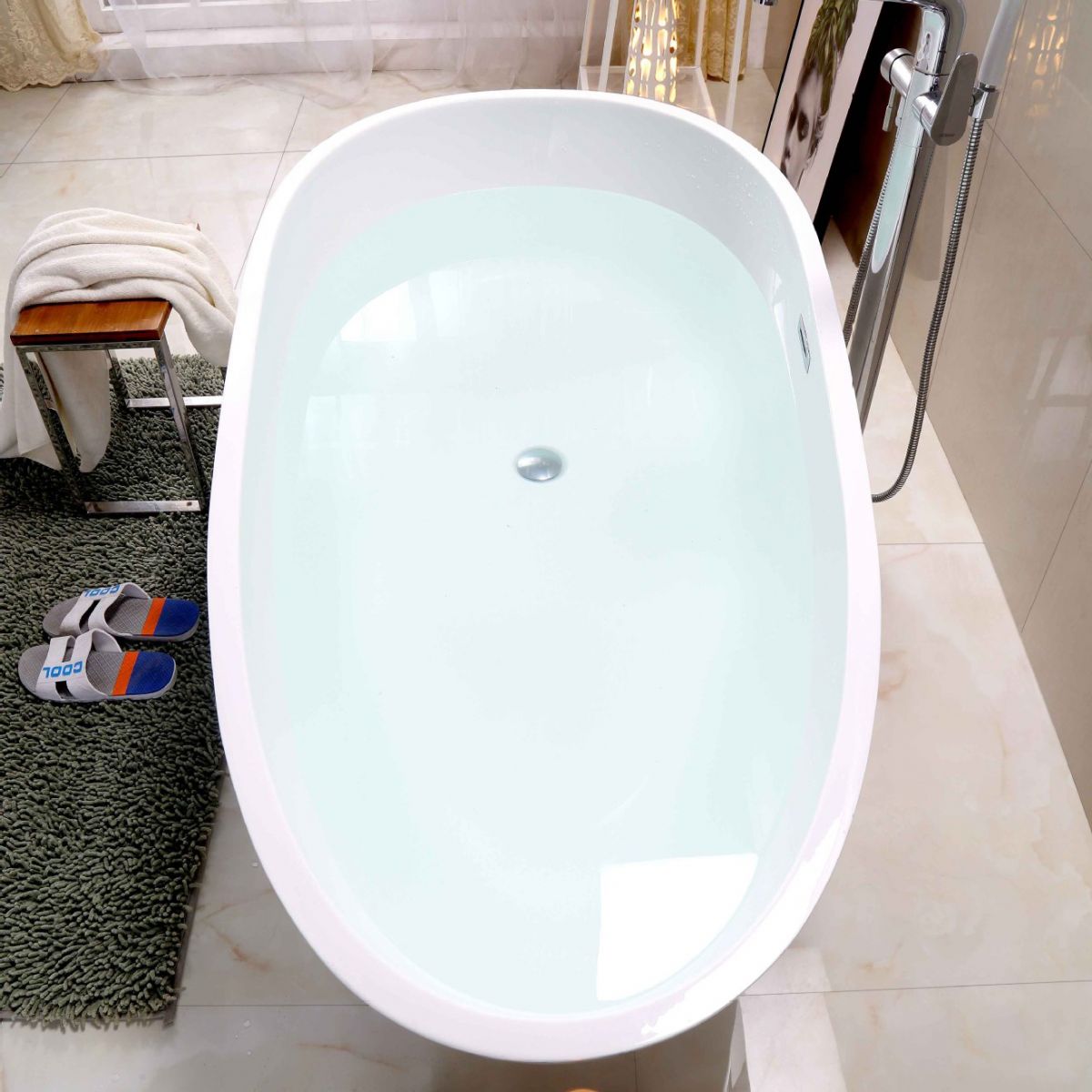 White Acrylic Oval Bathtub Freestanding Soaking Bath Tub with Center Drain Clearhalo 'Bathroom Remodel & Bathroom Fixtures' 'Bathtubs' 'Home Improvement' 'home_improvement' 'home_improvement_bathtubs' 'Showers & Bathtubs' 1200x1200_5e55673a-4bbc-46e3-a499-b395f1145038