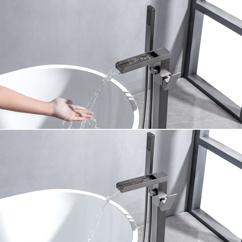 Floor Mounted Metal Freestanding Tub Filler Swivel Freestanding Faucet with Spray Gun Clearhalo 'Bathroom Remodel & Bathroom Fixtures' 'Bathtub Faucets' 'bathtub_faucets' 'Home Improvement' 'home_improvement' 'home_improvement_bathtub_faucets' 1200x1200_e3bcd81b-c7f0-4e32-b026-f37f92e6a212