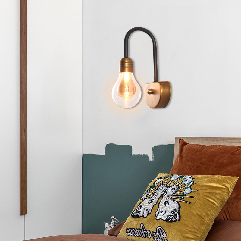 Clear Glass Bulb Wall Lighting Contemporary 1/2/3 Lights Led Wall Sconce Light in Brass with Curved Arm 1.0 Brass Clearhalo 'Cast Iron' 'Glass' 'Industrial' 'Modern wall lights' 'Modern' 'Tiffany' 'Traditional wall lights' 'Wall Lamps & Sconces' 'Wall Lights' Lighting' 129019