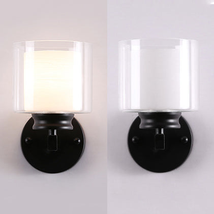 Cylinder Clear Glass Sconce Lighting Modern 1 Light Black/Chrome Wall Mounted Light Fixture Clearhalo 'Cast Iron' 'Glass' 'Industrial' 'Modern wall lights' 'Modern' 'Tiffany' 'Traditional wall lights' 'Wall Lamps & Sconces' 'Wall Lights' Lighting' 131680