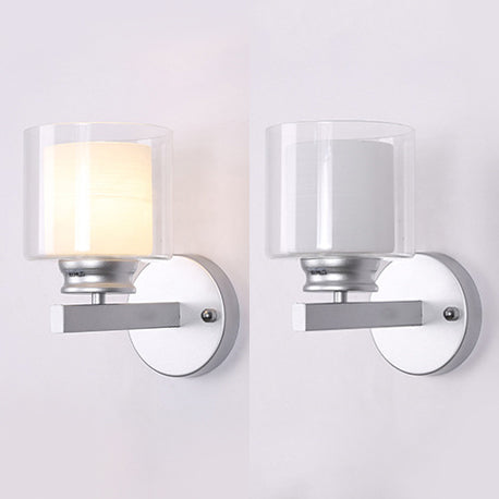 Cylinder Clear Glass Sconce Lighting Modern 1 Light Black/Chrome Wall Mounted Light Fixture Clearhalo 'Cast Iron' 'Glass' 'Industrial' 'Modern wall lights' 'Modern' 'Tiffany' 'Traditional wall lights' 'Wall Lamps & Sconces' 'Wall Lights' Lighting' 131683
