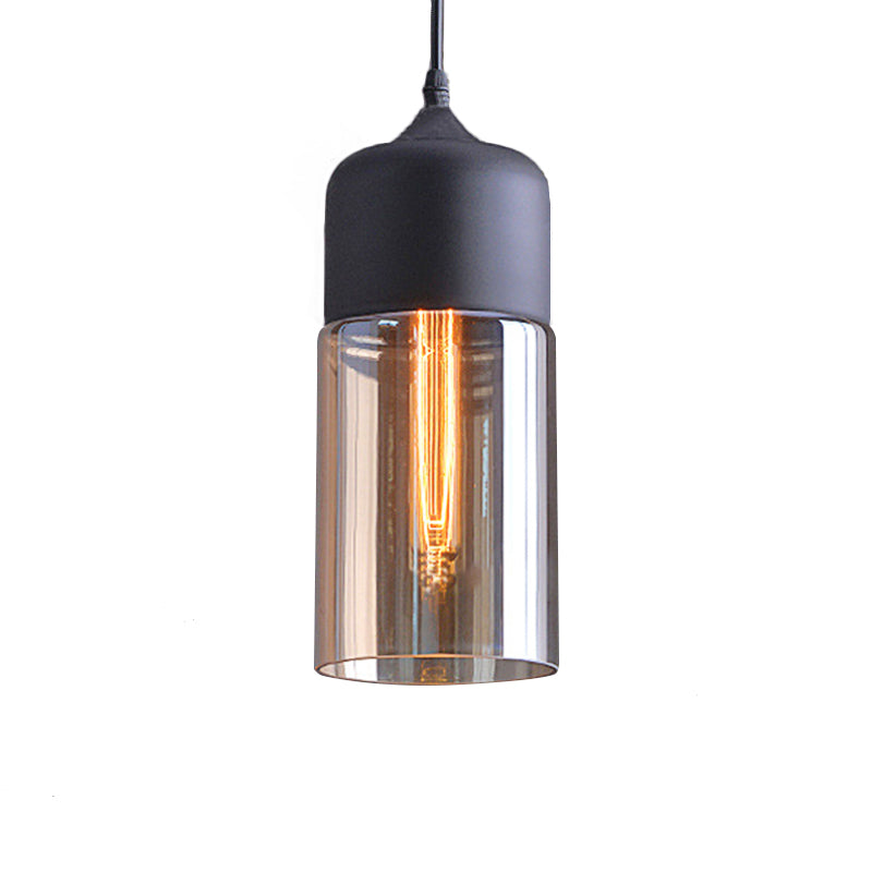 Cylinder Pendant Lighting Industrial 1 Light Brown Glass Hanging Ceiling Light in Black, 5"/7"/8" Wide Clearhalo 'Ceiling Lights' 'Glass shade' 'Glass' 'Industrial Pendants' 'Industrial' 'Middle Century Pendants' 'Pendant Lights' 'Pendants' 'Tiffany' Lighting' 136288