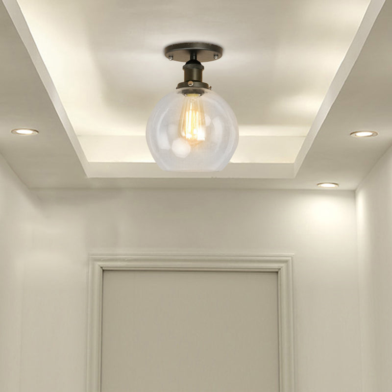 Spherical Balcony Semi Flush Industrial Clear Glass One Light Black/Brass/Copper Ceiling Light Fixture Black Clearhalo 'Ceiling Lights' 'Close To Ceiling Lights' 'Close to ceiling' 'Glass shade' 'Glass' 'Semi-flushmount' Lighting' 138728