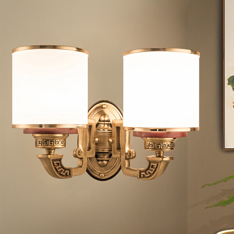 White Glass Cylinder Wall Mount Lamp Traditional 2 Bulbs Living Room Sconce Lighting in Brass Clearhalo 'Wall Lamps & Sconces' 'Wall Lights' Lighting' 1400329