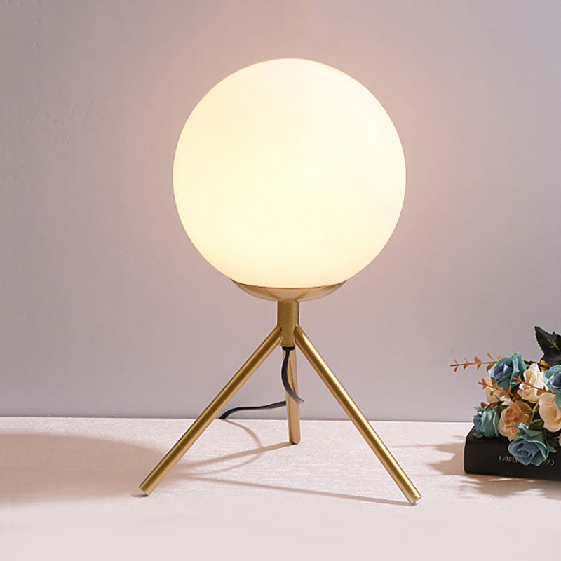 White Glass Globe Table Lamp Modern 1 Light Black/Gold Night Table Lamp with Tripod Base Gold Clearhalo 'Lamps' 'Table Lamps' Lighting' 140909