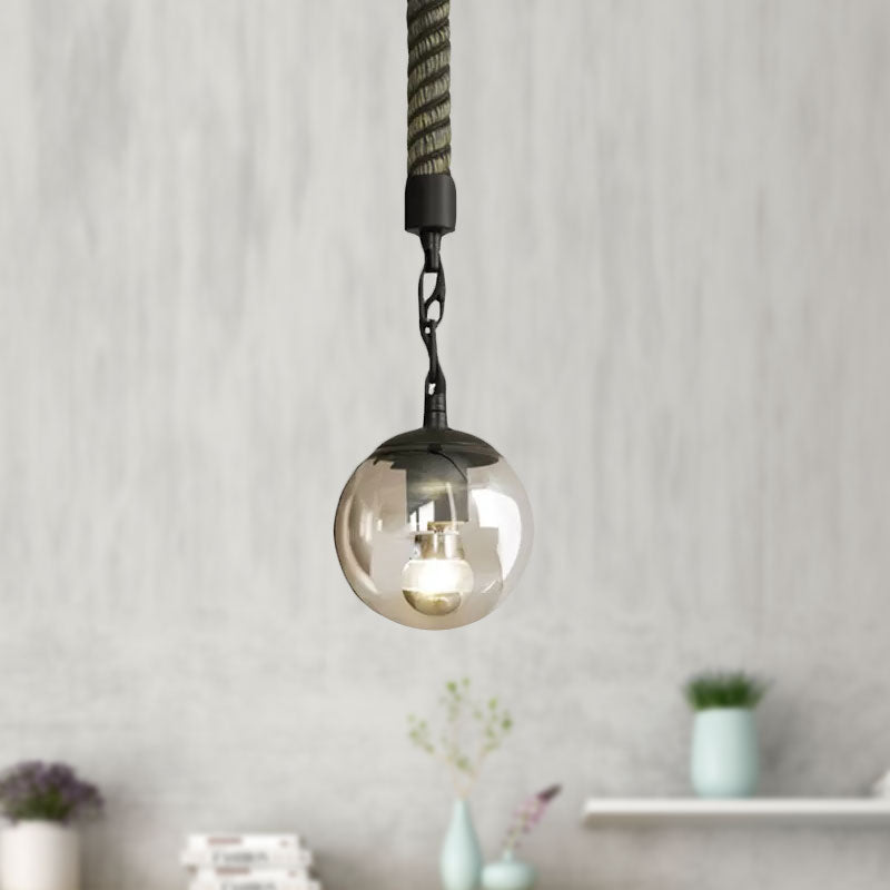1 Light Tan Glass Pendant Light Lodge Stylish Black Finish Ball Restaurant Hanging Light with Rope Clearhalo 'Ceiling Lights' 'Glass shade' 'Glass' 'Industrial Pendants' 'Industrial' 'Middle Century Pendants' 'Pendant Lights' 'Pendants' 'Tiffany' Lighting' 1416042