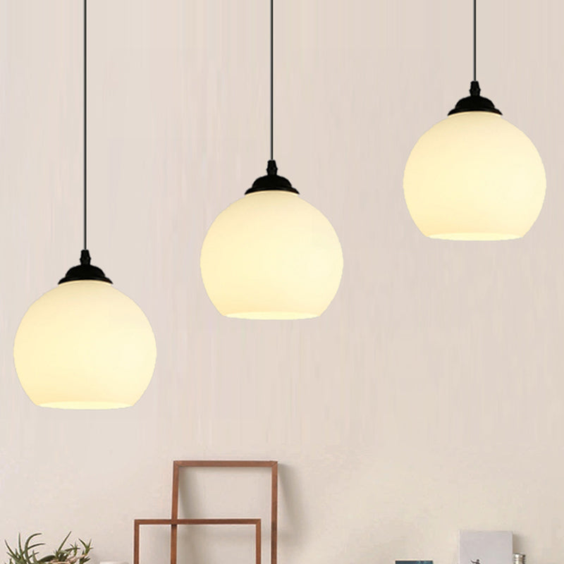 Black Orb Pendant Ceiling Light Farmhouse White Glass 1 Light Dining Room Hanging Lamp Clearhalo 'Ceiling Lights' 'Glass shade' 'Glass' 'Industrial Pendants' 'Industrial' 'Middle Century Pendants' 'Pendant Lights' 'Pendants' 'Tiffany' Lighting' 1416695