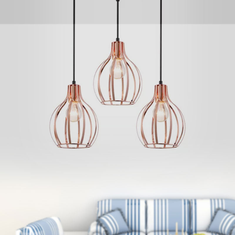 Metallic Rose Gold Pendant Lighting Global Cage Shade 3 Lights Industrial Style Ceiling Light Fixture with Round/Linear Canopy Clearhalo 'Ceiling Lights' 'Modern Pendants' 'Modern' 'Pendant Lights' 'Pendants' Lighting' 1417252