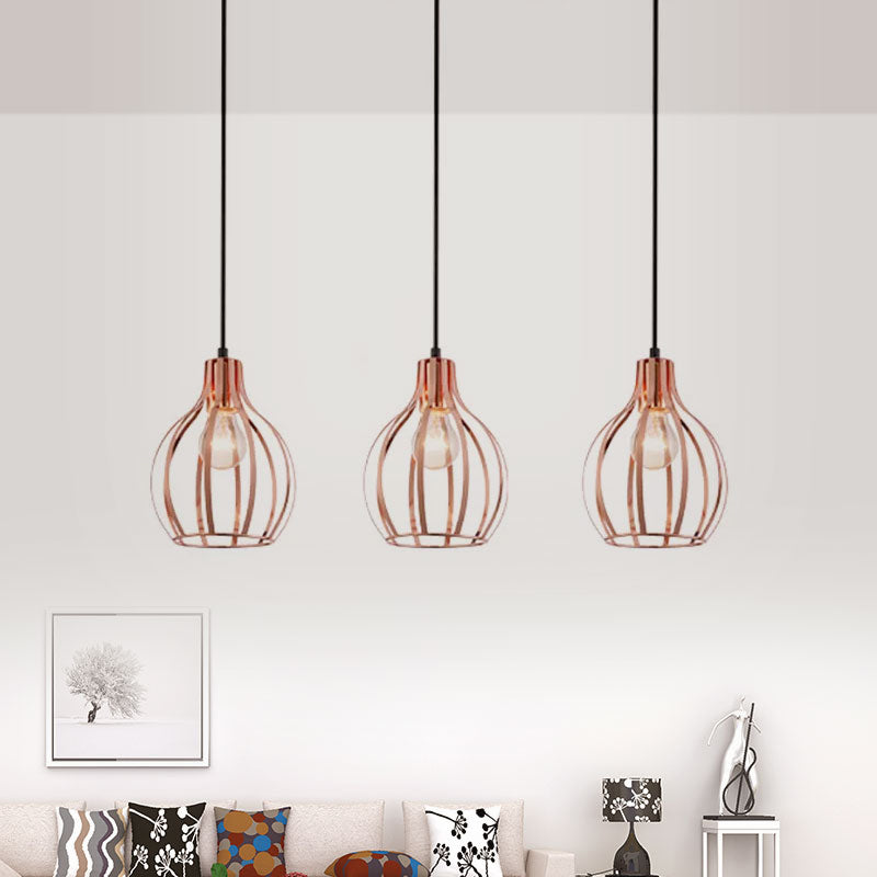 Metallic Rose Gold Pendant Lighting Global Cage Shade 3 Lights Industrial Style Ceiling Light Fixture with Round/Linear Canopy Clearhalo 'Ceiling Lights' 'Modern Pendants' 'Modern' 'Pendant Lights' 'Pendants' Lighting' 1417253