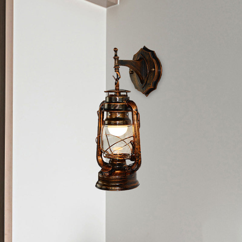One Bulb Wall Light with Lantern Shade Clear Glass Coastal Bathroom Sconce in Antique Copper Clearhalo 'Art deco wall lights' 'Cast Iron' 'Glass' 'Industrial wall lights' 'Industrial' 'Middle century wall lights' 'Modern' 'Rustic wall lights' 'Tiffany' 'Traditional wall lights' 'Wall Lamps & Sconces' 'Wall Lights' Lighting' 1419908