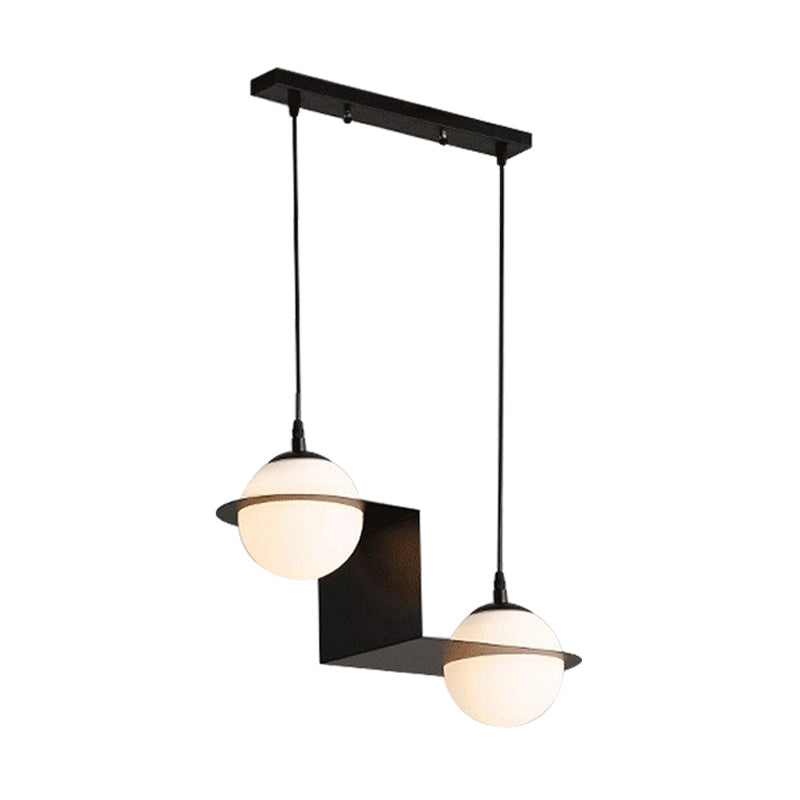 Ball White Glass Cluster Pendant with Straight/Curved Design Modernist 2/3 Lights Black Led Hanging Lamp Clearhalo 'Ceiling Lights' 'Glass shade' 'Glass' 'Modern Pendants' 'Modern' 'Pendant Lights' 'Pendants' Lighting' 143067