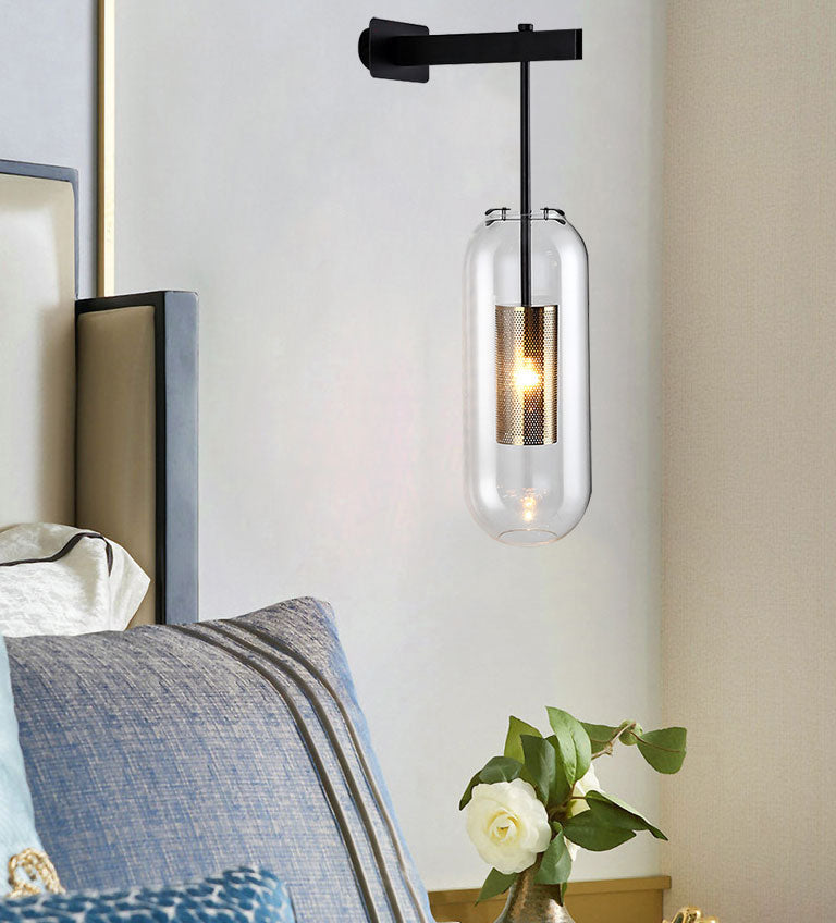Cylinder Clear Glass Sconce Lighting Modern 1 Light Black/Gold Wall Mounted Light Fixture Black Clearhalo 'Cast Iron' 'Glass' 'Industrial' 'Modern wall lights' 'Modern' 'Tiffany' 'Traditional wall lights' 'Wall Lamps & Sconces' 'Wall Lights' Lighting' 144554