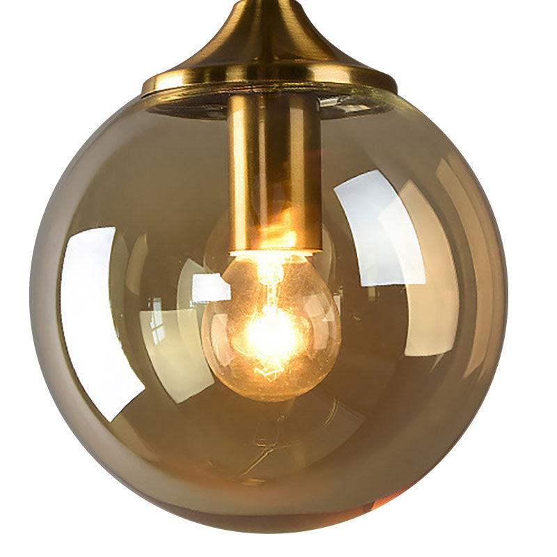 Clear/Smoke/Amber Glass Round Sconce Lamp Modernist 1 Light Wall Mounted Light in Gold for Living Room Clearhalo 'Cast Iron' 'Glass' 'Industrial' 'Modern wall lights' 'Modern' 'Tiffany' 'Traditional wall lights' 'Wall Lamps & Sconces' 'Wall Lights' Lighting' 144637