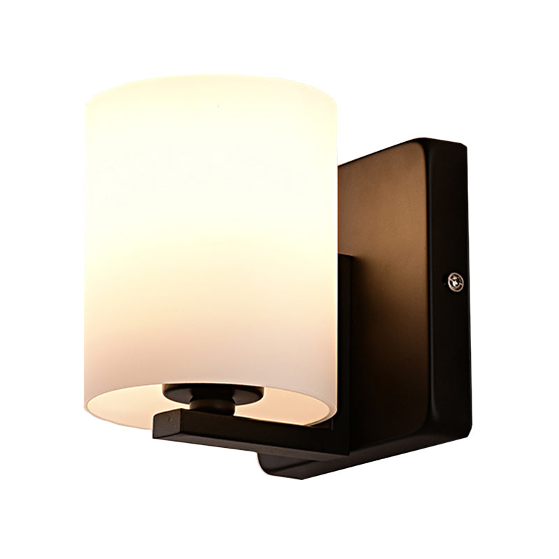 White Shade Sconce Light with Black Base 1 Light Modern Style Milk Glass Wall Sconce for Living Room Clearhalo 'Cast Iron' 'Glass' 'Industrial' 'Modern wall lights' 'Modern' 'Tiffany' 'Traditional wall lights' 'Wall Lamps & Sconces' 'Wall Lights' Lighting' 145135