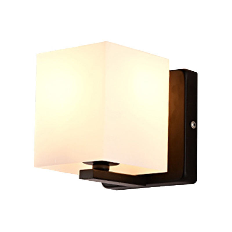 White Shade Sconce Light with Black Base 1 Light Modern Style Milk Glass Wall Sconce for Living Room Clearhalo 'Cast Iron' 'Glass' 'Industrial' 'Modern wall lights' 'Modern' 'Tiffany' 'Traditional wall lights' 'Wall Lamps & Sconces' 'Wall Lights' Lighting' 145138