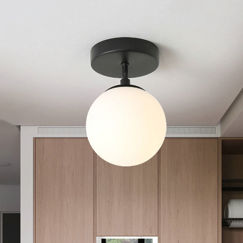 Single Bulb Corridor Ceiling Flush Simple Black Semi Flush Mount Light with Mini Spherical Milk Glass Shade Black Clearhalo 'Ceiling Lights' 'Close To Ceiling Lights' 'Close to ceiling' 'Glass shade' 'Glass' 'Semi-flushmount' Lighting' 1454784