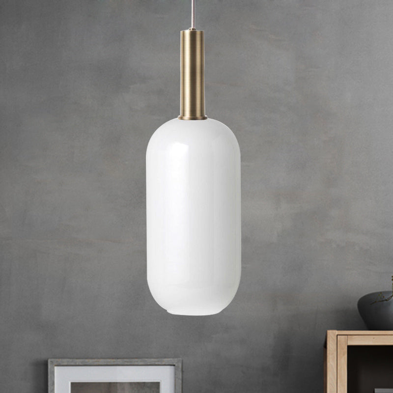 Opal Matte Glass Oblong Ceiling Pendant Minimalist 1 Light Brass Hanging Lamp Kit over Table White Clearhalo 'Ceiling Lights' 'Glass shade' 'Glass' 'Modern Pendants' 'Modern' 'Pendant Lights' 'Pendants' Lighting' 1454897