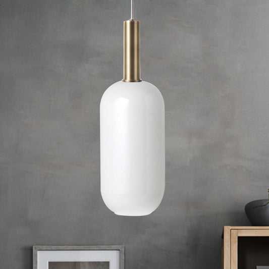 Opal Matte Glass Oblong Ceiling Pendant Minimalist 1 Light Brass Hanging Lamp Kit over Table White Clearhalo 'Ceiling Lights' 'Glass shade' 'Glass' 'Modern Pendants' 'Modern' 'Pendant Lights' 'Pendants' Lighting' 1454897