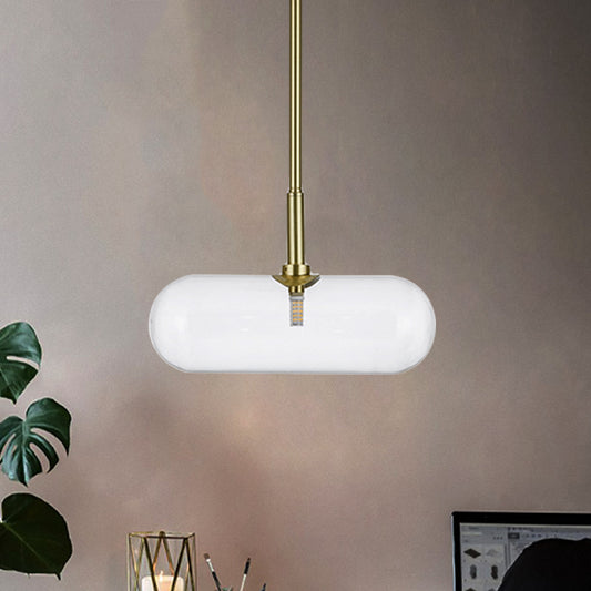 Minimalist Capsule Clear Glass Pendant Single-Bulb Suspended Lighting Fixture in Gold Gold Clearhalo 'Ceiling Lights' 'Glass shade' 'Glass' 'Modern Pendants' 'Modern' 'Pendant Lights' 'Pendants' Lighting' 1454927