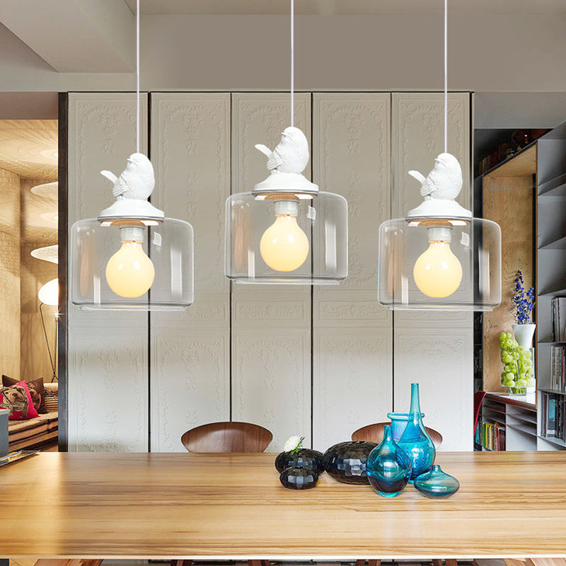 Drum Shaped Dinette Pendant Lamp Clear Glass 1 Bulb Modern Hanging Lamp Kit with White Bird Top Clearhalo 'Ceiling Lights' 'Glass shade' 'Glass' 'Modern Pendants' 'Modern' 'Pendant Lights' 'Pendants' Lighting' 1454938