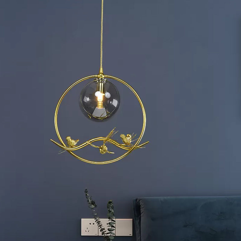 Brass Ring Hanging Pendant Mid-Century Single Bulb Metal Ceiling Lamp with Amber/Smoke Grey Glass Shade and Bird Deco Smoke Gray Clearhalo 'Ceiling Lights' 'Glass shade' 'Glass' 'Modern Pendants' 'Modern' 'Pendant Lights' 'Pendants' Lighting' 1455015