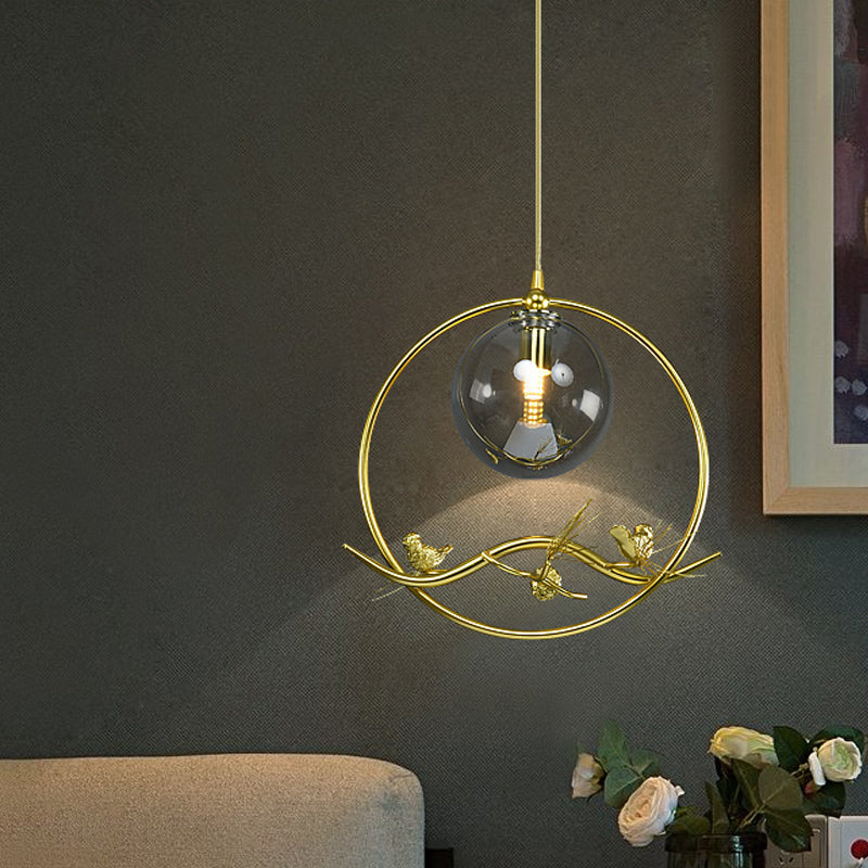 Brass Ring Hanging Pendant Mid-Century Single Bulb Metal Ceiling Lamp with Amber/Smoke Grey Glass Shade and Bird Deco Clearhalo 'Ceiling Lights' 'Glass shade' 'Glass' 'Modern Pendants' 'Modern' 'Pendant Lights' 'Pendants' Lighting' 1455016