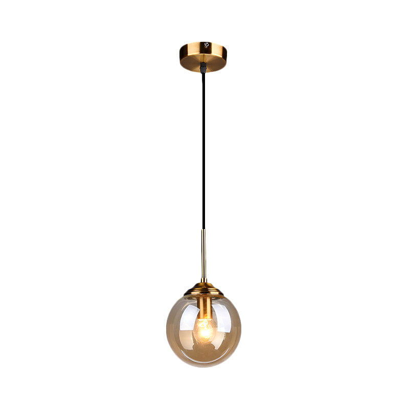 1-Light Dining Room Ceiling Pendant Simple Brass Hanging Lamp with Spherical Amber/Smoke Glass Shade Clearhalo 'Ceiling Lights' 'Close To Ceiling Lights' 'Glass shade' 'Glass' 'Modern Pendants' 'Modern' 'Pendant Lights' 'Pendants' Lighting' 1455022