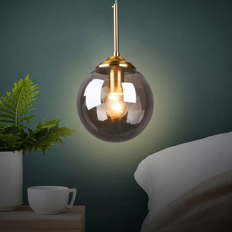 1-Light Dining Room Ceiling Pendant Simple Brass Hanging Lamp with Spherical Amber/Smoke Glass Shade Smoke Gray Clearhalo 'Ceiling Lights' 'Close To Ceiling Lights' 'Glass shade' 'Glass' 'Modern Pendants' 'Modern' 'Pendant Lights' 'Pendants' Lighting' 1455024