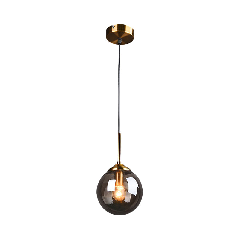 1-Light Dining Room Ceiling Pendant Simple Brass Hanging Lamp with Spherical Amber/Smoke Glass Shade Clearhalo 'Ceiling Lights' 'Close To Ceiling Lights' 'Glass shade' 'Glass' 'Modern Pendants' 'Modern' 'Pendant Lights' 'Pendants' Lighting' 1455027