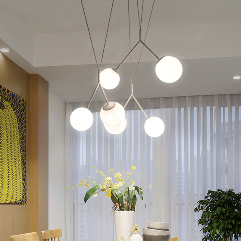 Modern 6 Lights Multi-Pendant Opaline Matte Glass White Intertwined Hanging Light with Orb Shade over Table Clearhalo 'Ceiling Lights' 'Glass shade' 'Glass' 'Modern Pendants' 'Modern' 'Pendant Lights' 'Pendants' Lighting' 1456098