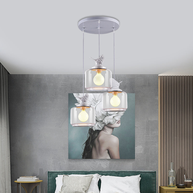 Drum Clear Glass Pendant Lighting Nordic 3 Bulbs White Multi Light Ceiling Light with Resin Bird Top Clearhalo 'Ceiling Lights' 'Glass shade' 'Glass' 'Modern Pendants' 'Modern' 'Pendant Lights' 'Pendants' Lighting' 1456104