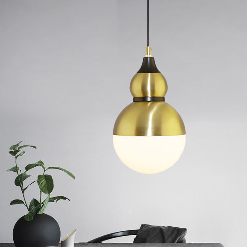 Black/Brass Gourd Shaped Pendant Lamp Mid Century Metal 1 Light Pendulum Light with Bottom White Glass Diffuser Brass Clearhalo 'Ceiling Lights' 'Glass shade' 'Glass' 'Modern Pendants' 'Modern' 'Pendant Lights' 'Pendants' Lighting' 1456445